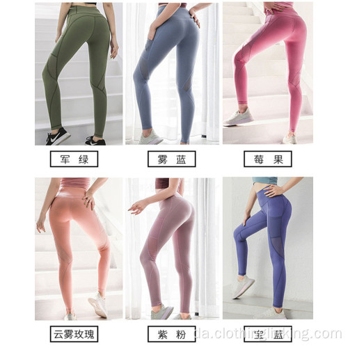 Kvinders yoga leggings med sidelommer